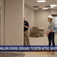 Superintendent Bob Szymoniak demonstrates how his new high school in Michigan is being designed with places to hide from mass shooters